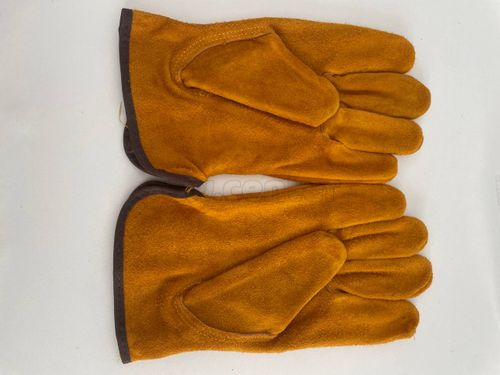 Перчатки желтые цельноспилковые EW